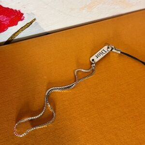 Dior Shimmering Silver phone holder